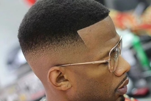 License To Style: The Bond Haircut Is The Sleek Grooming Trend Black Men Should Try Now