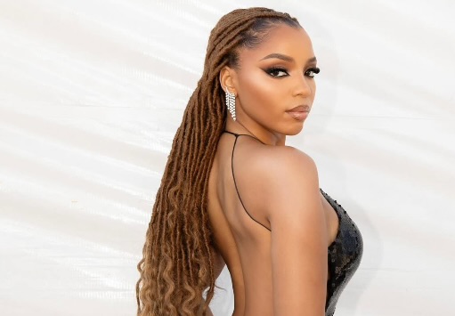Twist, Tuck, And Slay: The Secrets Behind Chlöe Bailey’s Most Iconic Loc Hairstyles