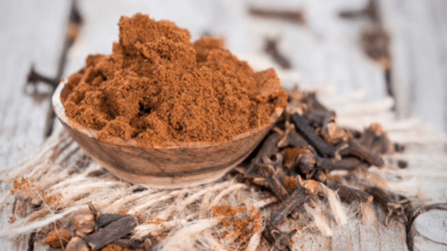 From Root To Tip: How Clove Powder Can Transform Your Natural Hair