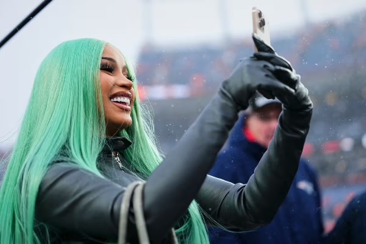 Loud, Green, Unapologetic: How Cardi B’s Super Bowl Hair Celebrated Bold Beauty For Black Women